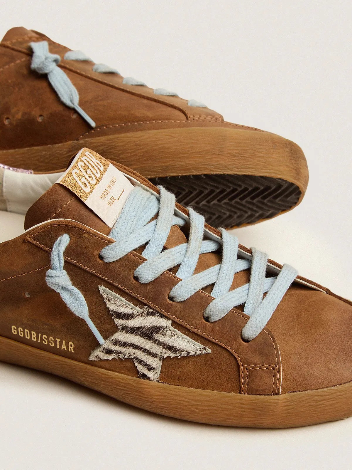 Super-Star sneakers in brown waxed suede with a zebra-print pony skin star