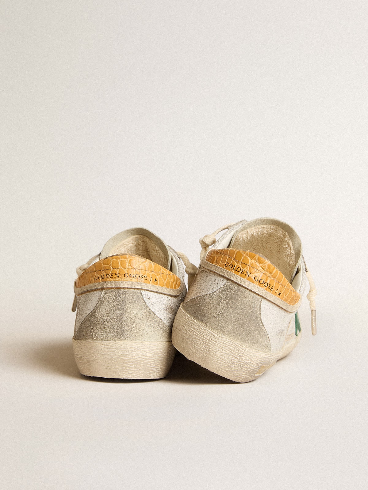 Super-Star with green suede star and yellow croc-print leather heel tab