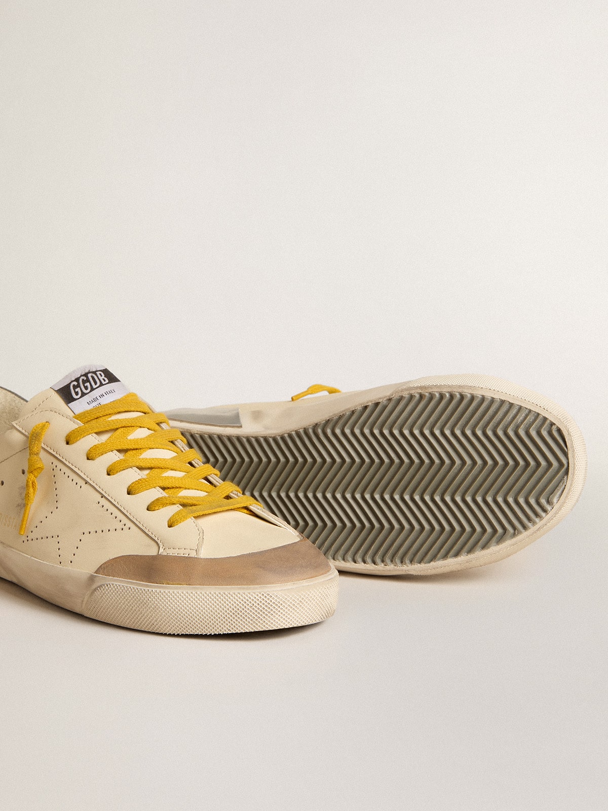 Super-Star in leather with perforated star and gray suede heel tab