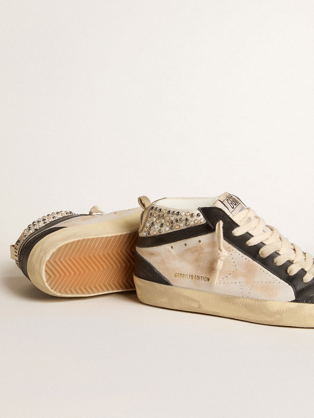 Mid Star LTD da donna in pelle nera e bianca con perle e stella traforata