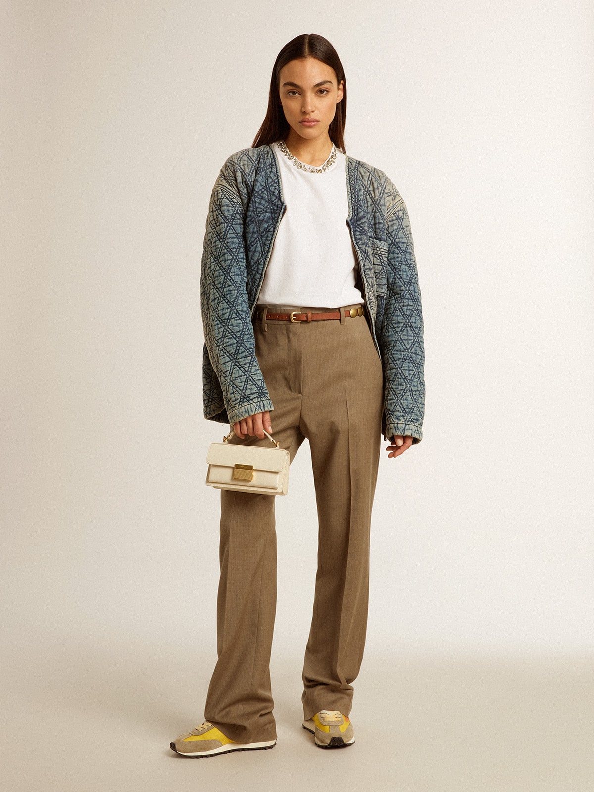 Women's blue quilted jacket in cotton denim with distressed finish